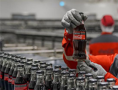 Durch die Übernahme entsteht der größte Coca-Cola Abfüller weltweit. Coca-Cola Europacific Partners wird neuer Unternehmensname