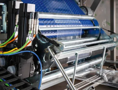 Verpackungsmaschine von Sidel: Ein Teil des Verpackungsprozesses mit der Stretchwickel-Technologie