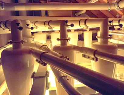 Die Zyklonscheideanlage trennt das Fördergut von der Luft, die zum Vertikaltransport eingesetzt wird, Bild: SEW-Eurodrive Die Zyklonscheideanlage trennt das Fördergut von der Luft, die zum Vertikaltransport eingesetzt wird.